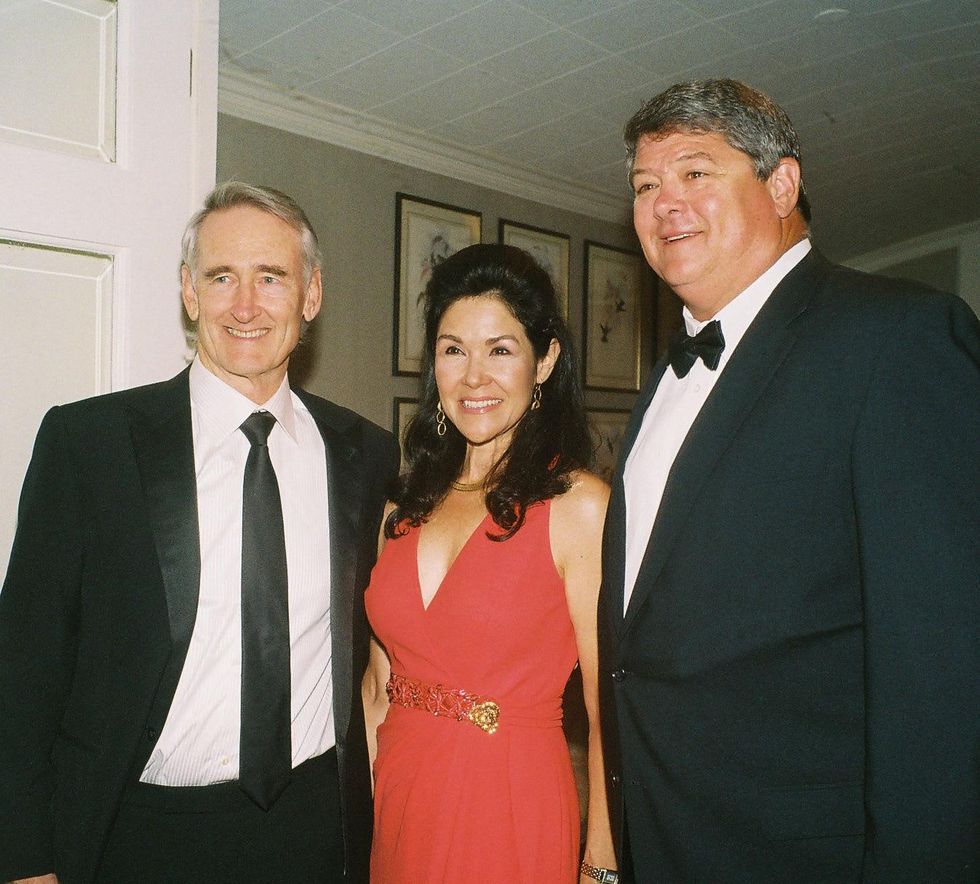 0009 Scott and Geraldina Wise, from left, with David Bailiff at the In Rice's Honor dinner October 2014