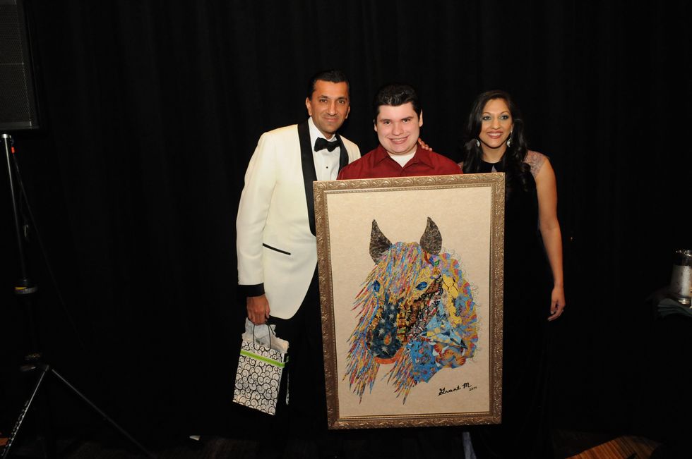 0266 Ajay Khurana, from left, Grant Manier and Sippi Khurana at the KNOWAutism Gala February 2015