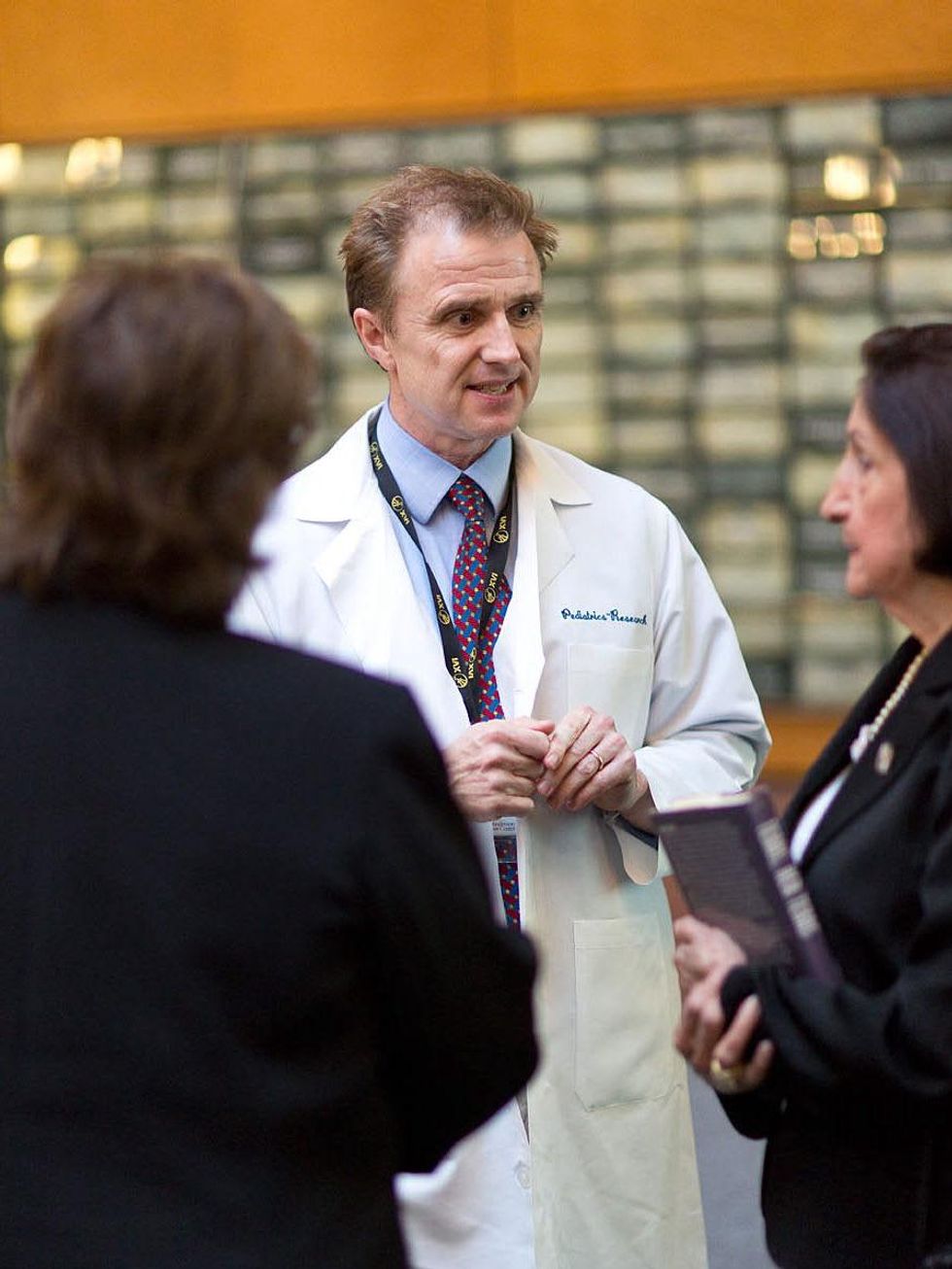 042 M.D. Anderson Childrens' Center opening May 2013 Dr. Laurence Cooper, professor at MD Anderson Children\u2019s Cancer Hospital