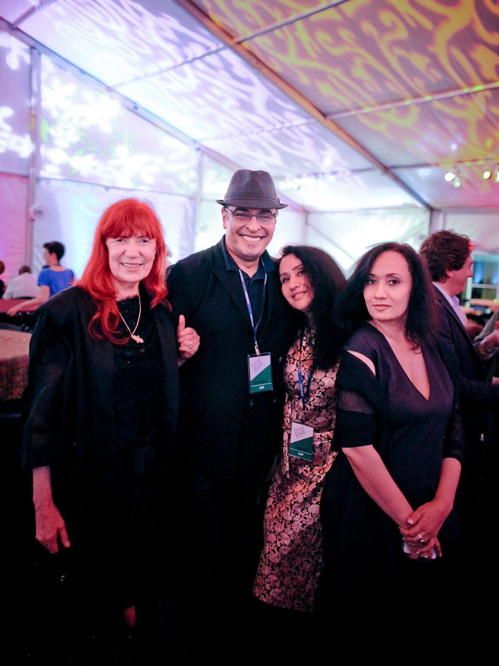 044 Karin Adrian von Roques, from left, Hamza Serafi, Raja Alem and Shadia Alem at the FotoFest opening party March 2014