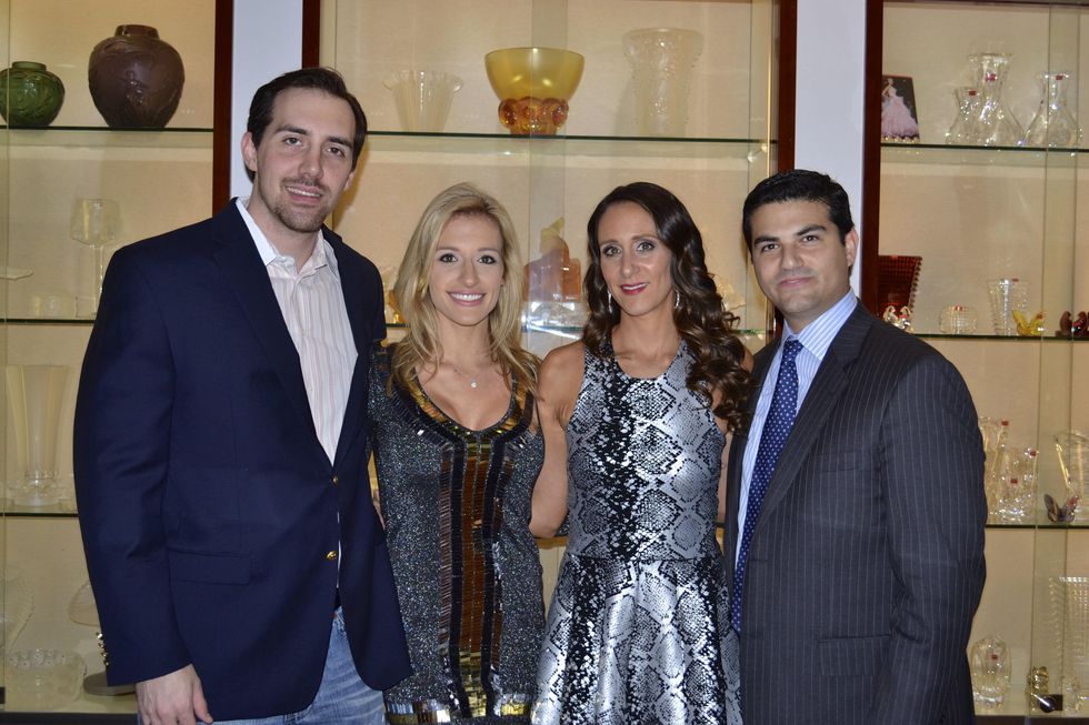 1 Aaron and Michelle Lewis, from left, and Amy and Segev Zadok at the Zadok Holiday Party December 2013