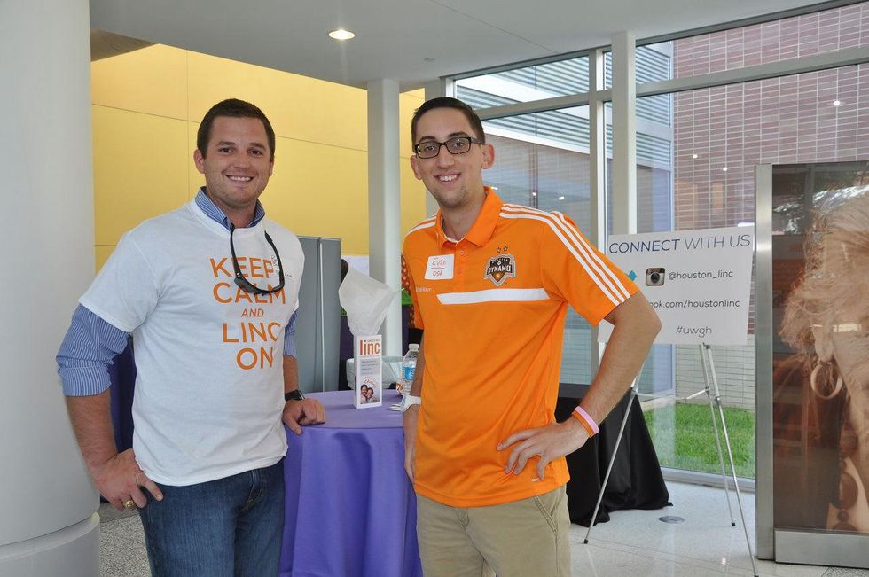 1 Beau Burgin, left, and Evan Kuterbach at young professionals build Tiny Libraries September 2014