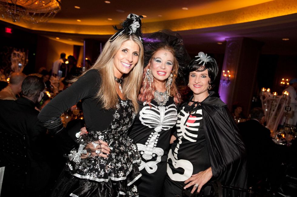 1 Gina Bhatia, from left, Cindi Rose and Mary D'Andrea at the Bone Bash Halloween party October 2013