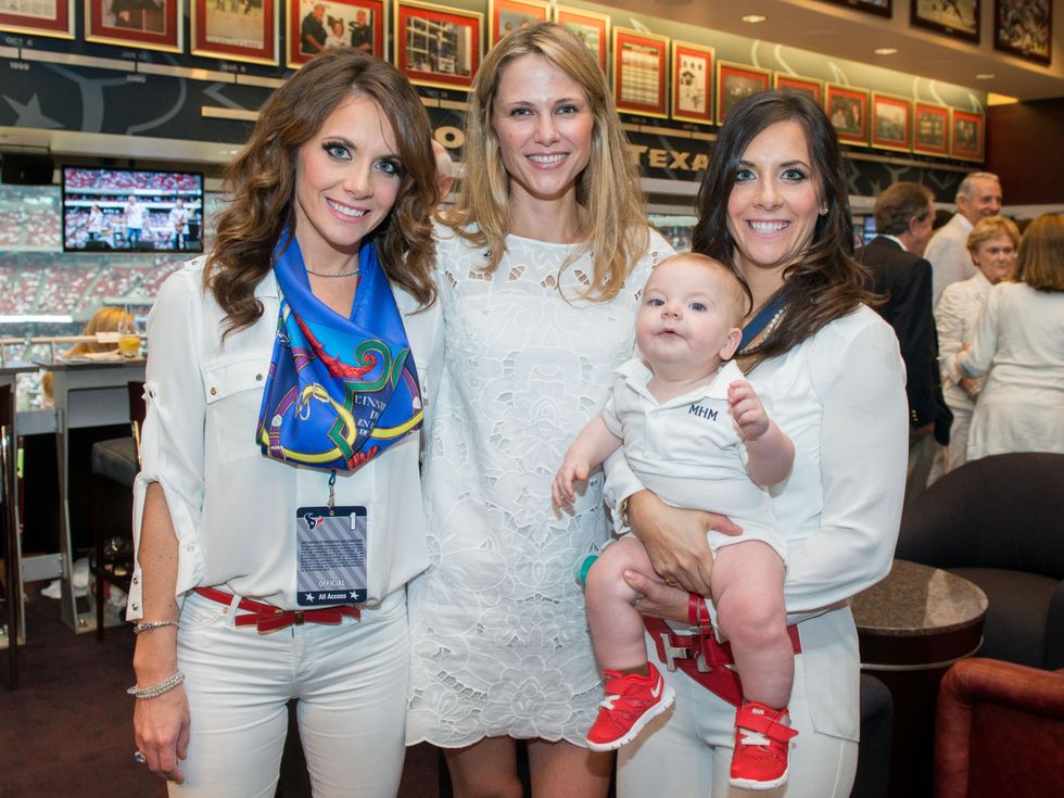 1 Joanna Marks, from left, Jessica Walker and Hannah McNair with Michael McNair at the Houston Texans Owner's Suite party at NRG Stadium September 2014