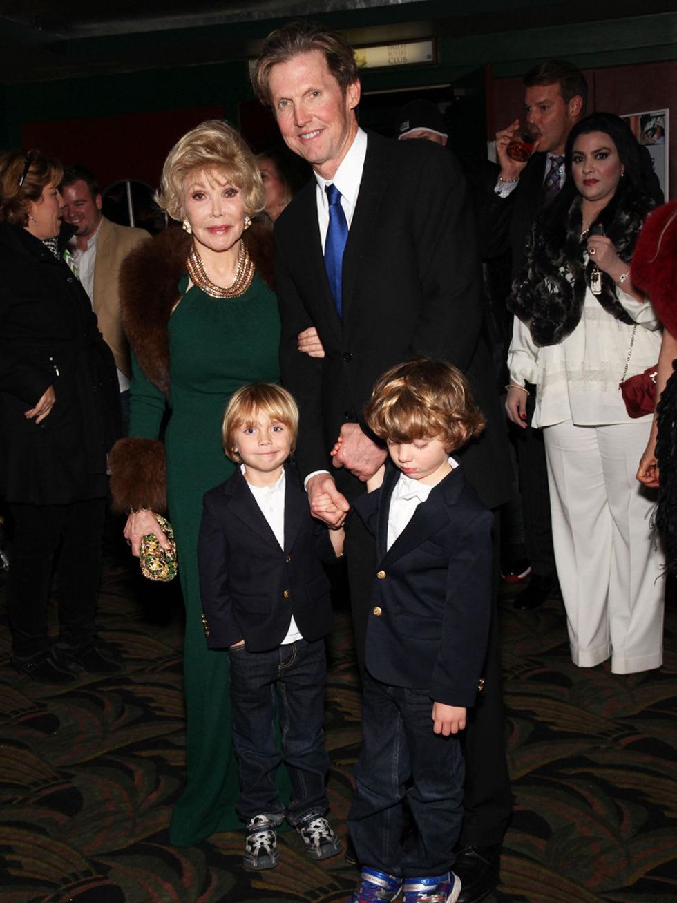 1 Joanne King Herring, from left, Beau king Jr., Beau King Sr. and Beckett King at A Little Christmas Business movie premiere December 2013