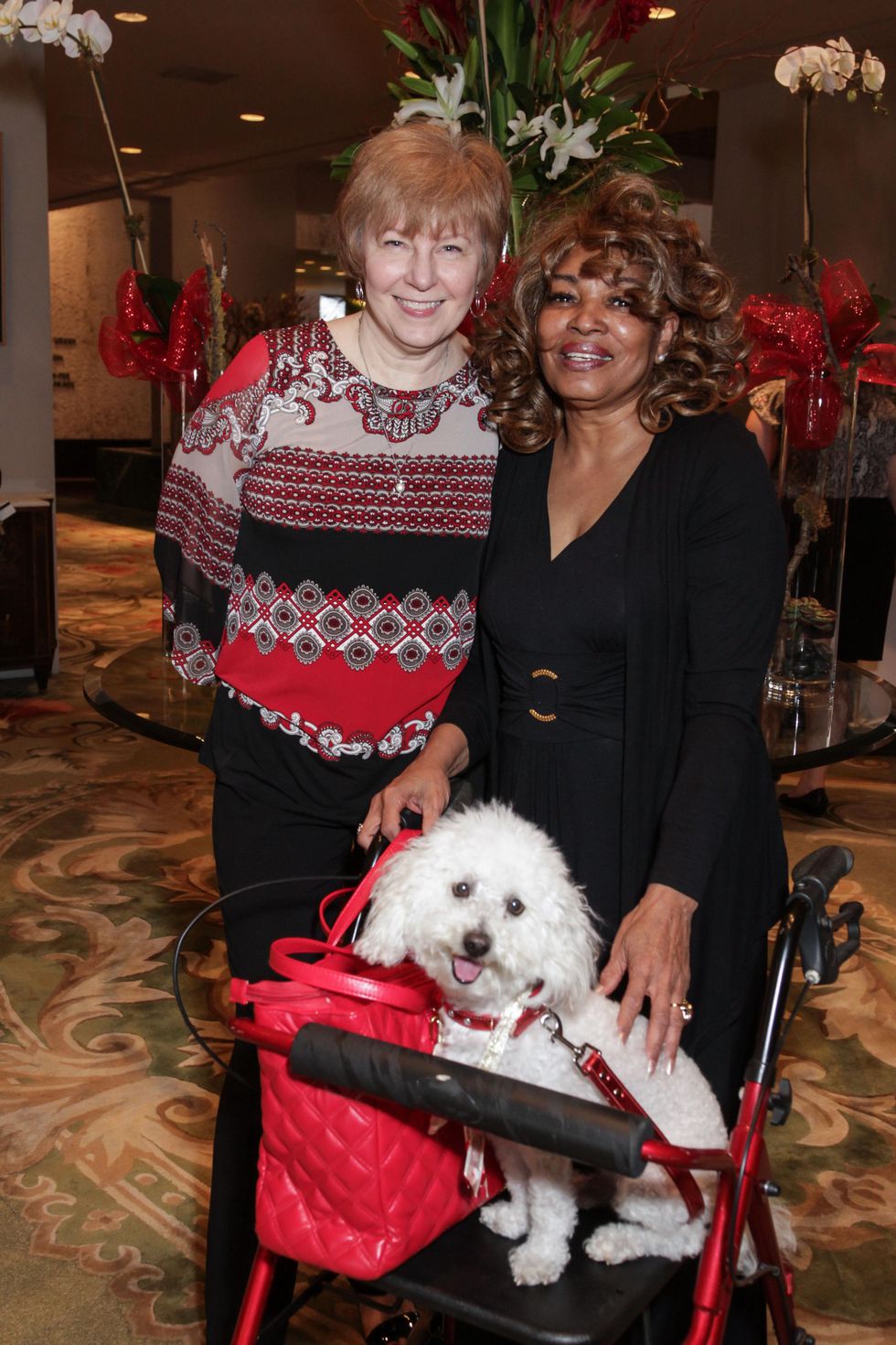 1 Kay Tegeler, left, and Lucille Bogany with Prince at the Best Friends Brunch benefiting aniMeals on Wheels February 2015