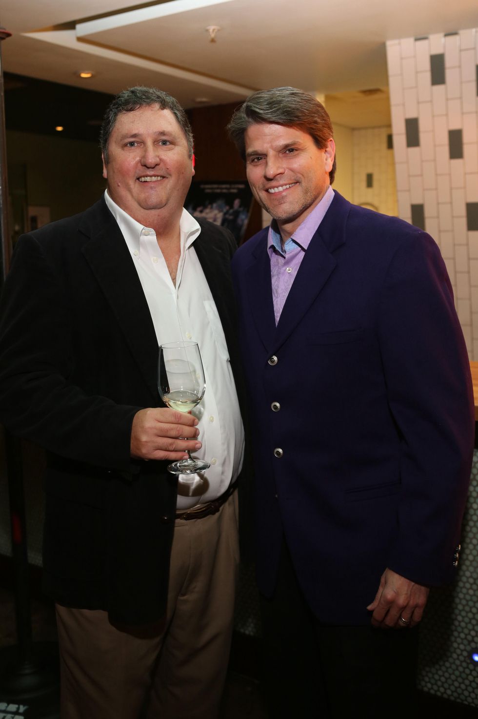 1 Mike Hensley, left, and Stephen Lewis at TUTS' Vine & Dine November 2014