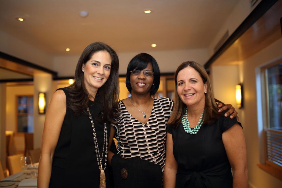 10 Karla Goudet, from left, Dr. Olotoye Olutoyin and Isabella Torras at the BCN dinner for Texas Children's Hospital September 2014