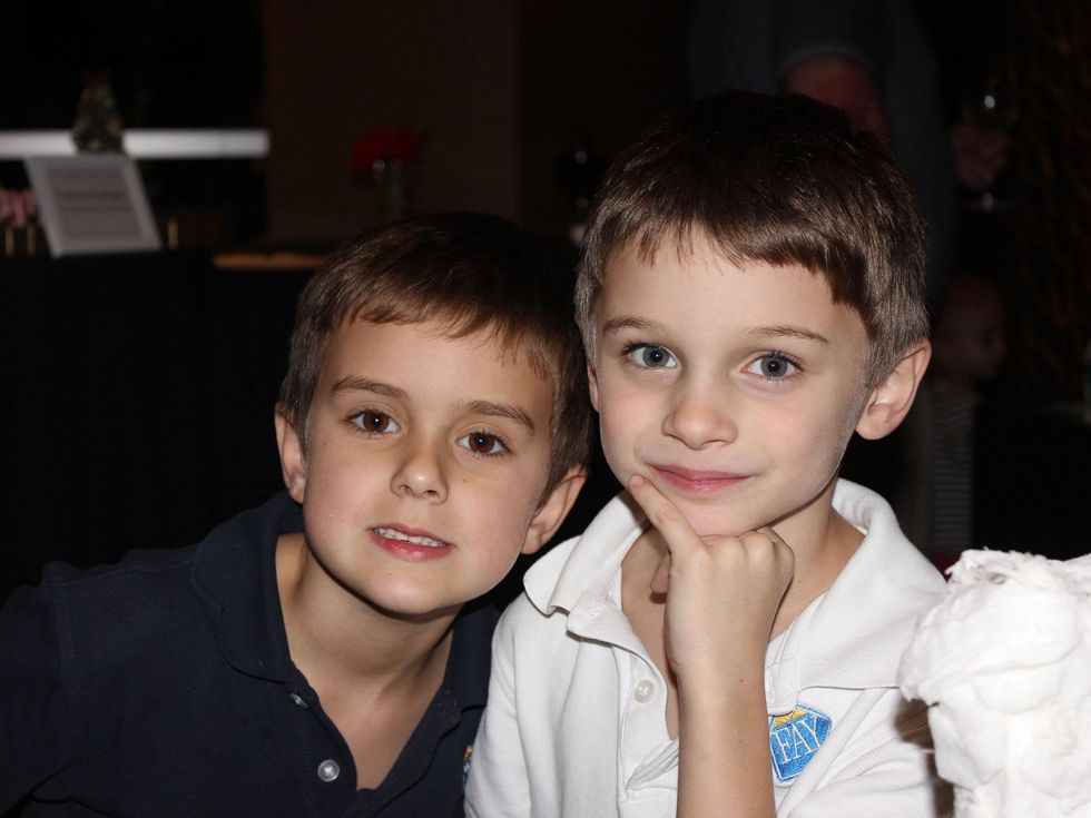 10 Smith Eingelsby, left, and Ares Kittell at the Lucky Dog Gingerbread Doghouse event December 2013