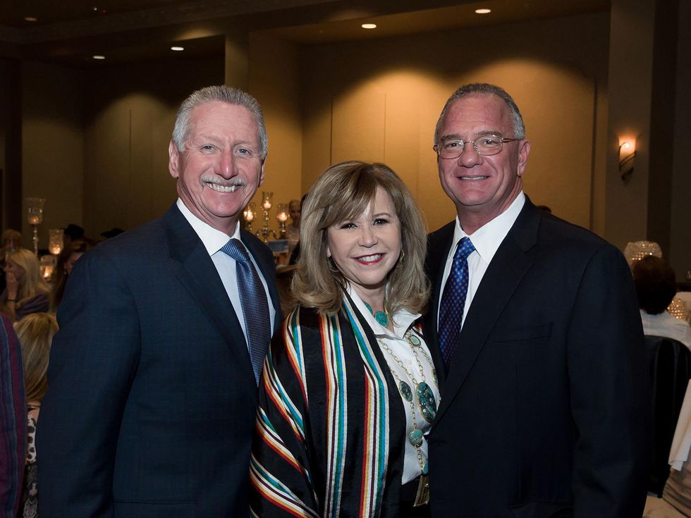 10 Thomas Roberts and Cyndy Garza Roberts, left, with Yance Montalbano at the Rodeo Trailblazer Awards Luncheon February 2015