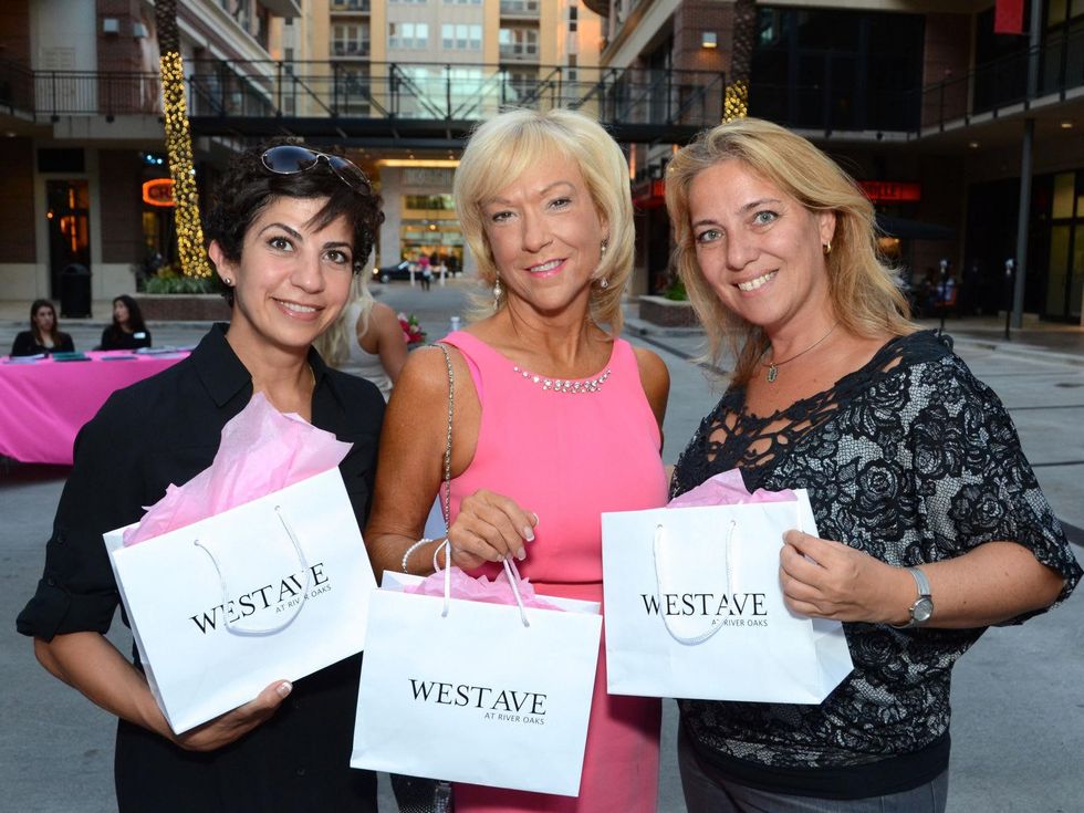 10 Toni Kuri, from left, Sherry Holman and Paula Leichen at the West Ave Turns Pink party October 2013