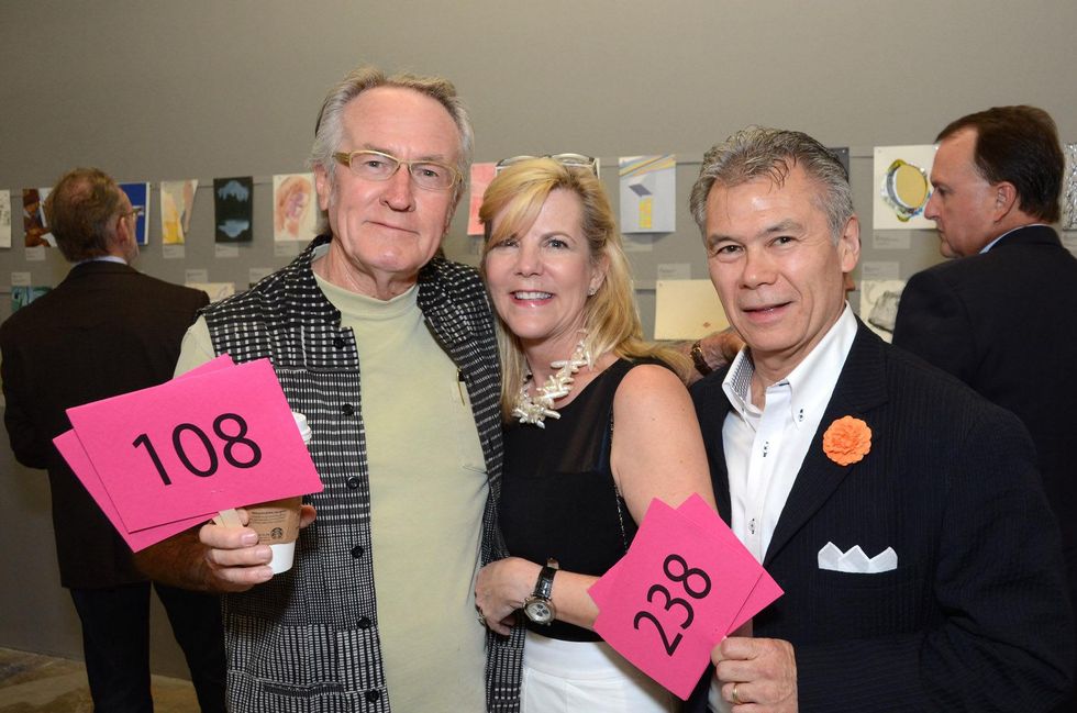 10 Wayne Gilbert, from left, with Dawn and Richard Gervais at Luck of the Draw May 2014