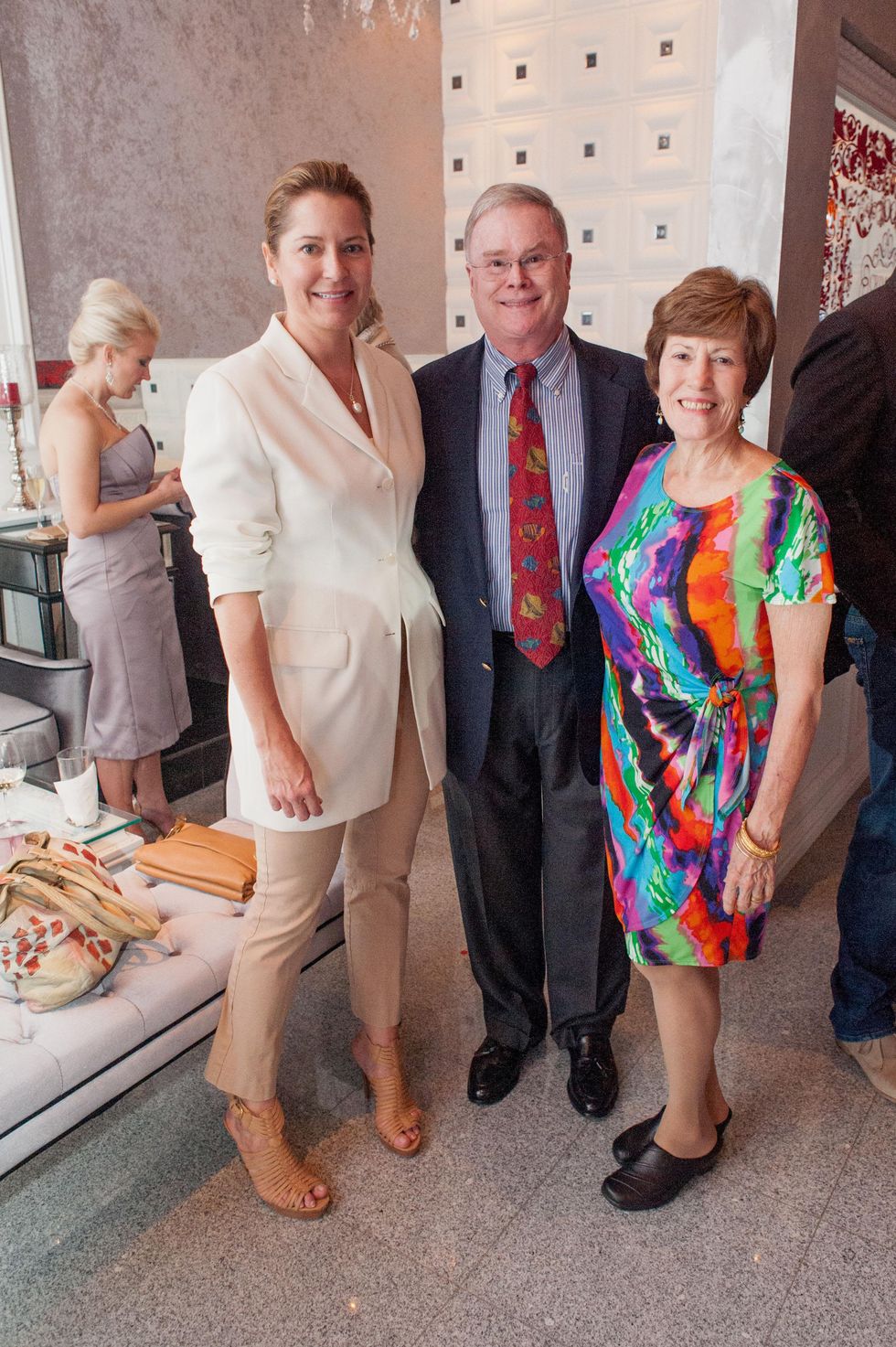 104 Kate McConnico, from left, with Jim and Judy Nicklos at the Stages Repertory Theatre Soiree Marie October 2014