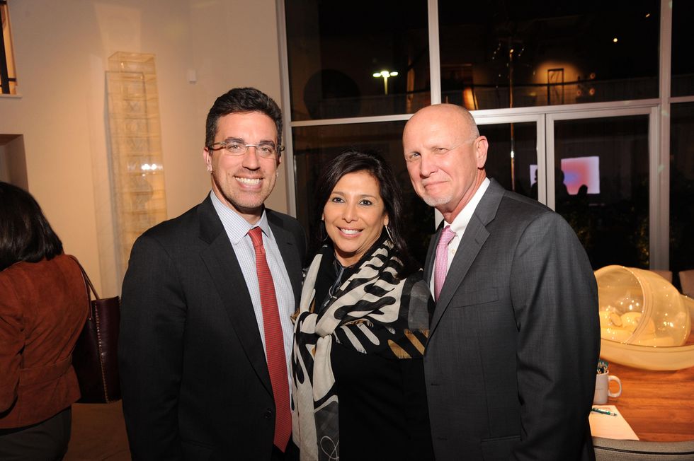 11 7229 Jamie Bennett, from left, Regina Garcia and Chuck Still at the reception for Jamie Bennett November 2014