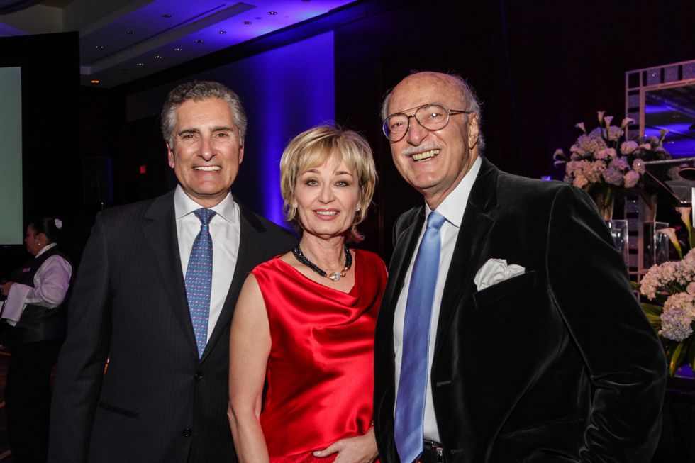 11 Giorgio and Cathy Borlenghi, left, with Shafik Rifaat at the Social Book Treasures dinner December 2014