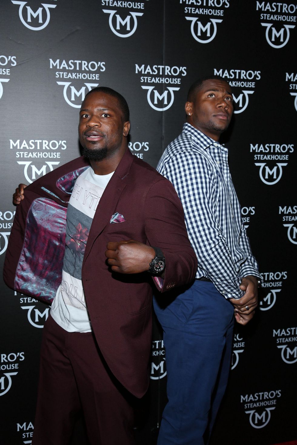 11 Jameel McClain, left, and Daniel Fells at the opening of Mastro's Steakhouse in NYC November 2014