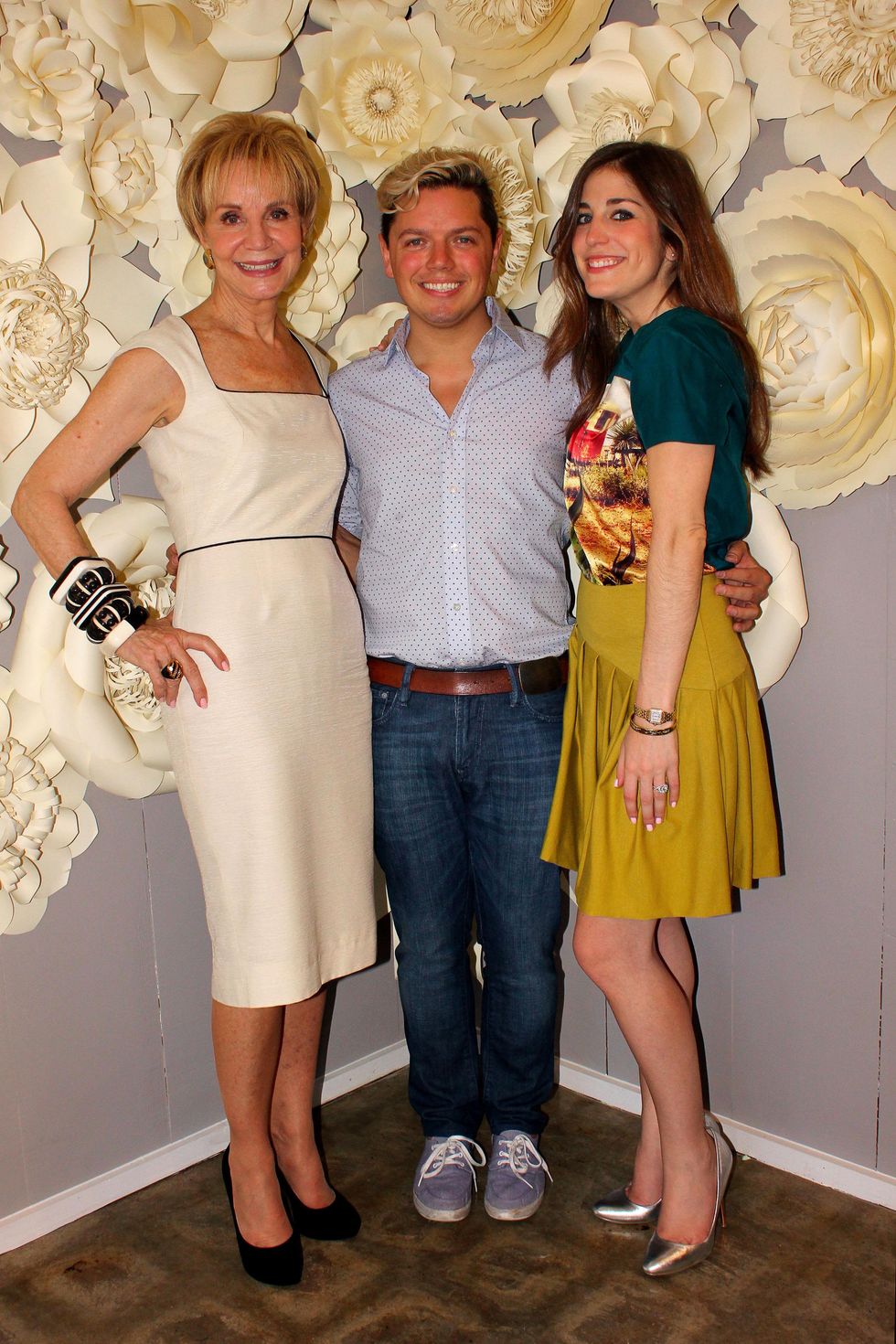 11 Leisa Holland-Nelson, from left, David Peck and Laura Max Nelson at the Dress for Dinner kickoff in new David Peck Showroom September 2014