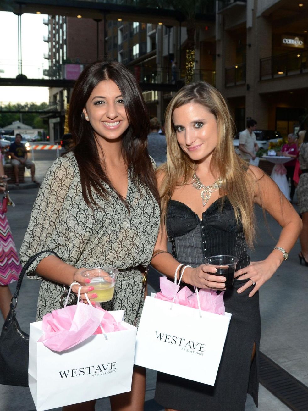 11 Megha Tejpal, left and Alexandra Kleinschmidt at the West Ave Turns Pink party October 2013