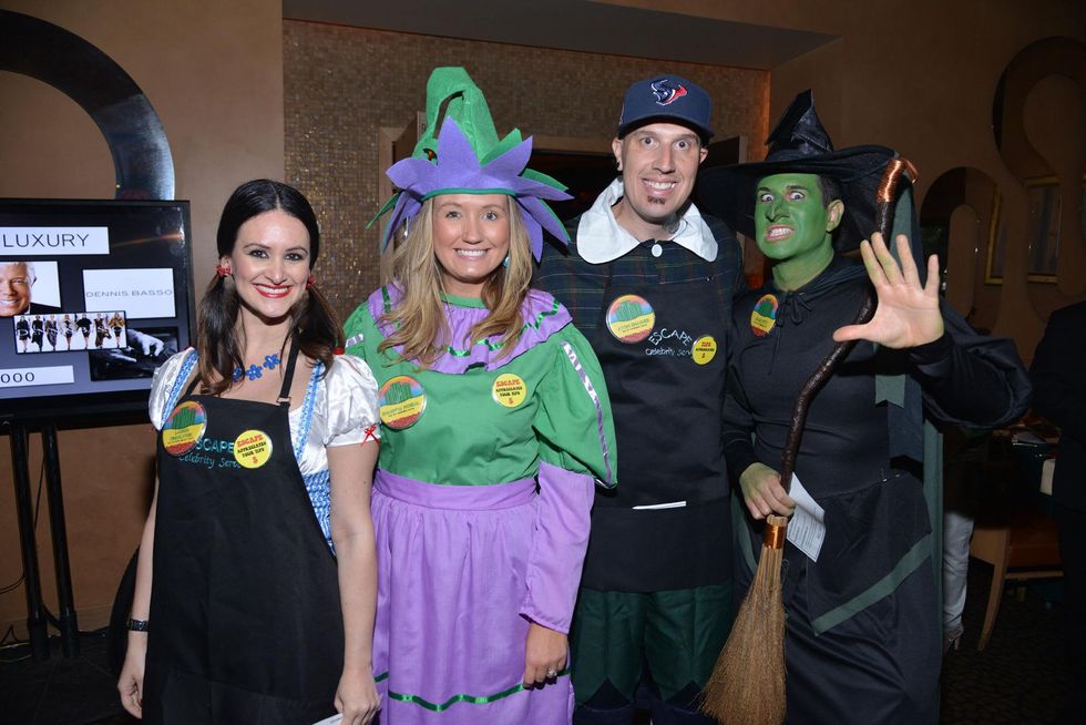 11S Lauren Finkelstein, from left, Shawnda McNeal, Atom Smasher and Chad Pitt at the Emerald City ESCAPE Celebrity Serve Benefit April 2014