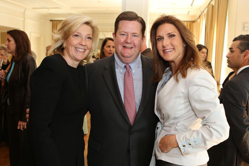12 Kathryn and Jeff Smith, left, with Frances Moore Jones at the The Center Luncheon February 2015