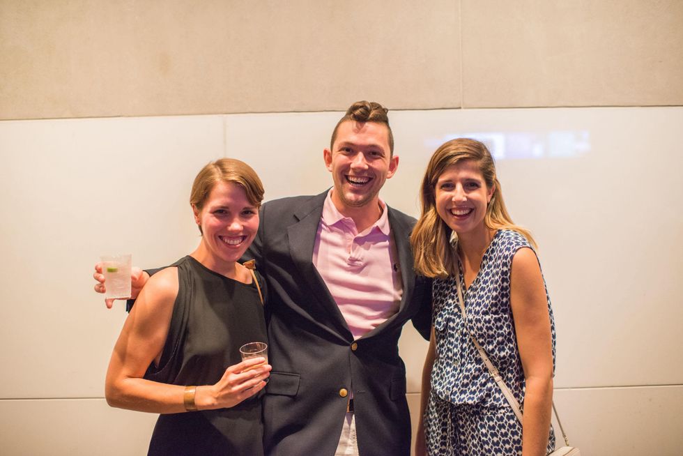 12 Kathryn McDougal, from left, David Dickson and Ariel Farshchi at the MFAH Art Crowd party September 2014