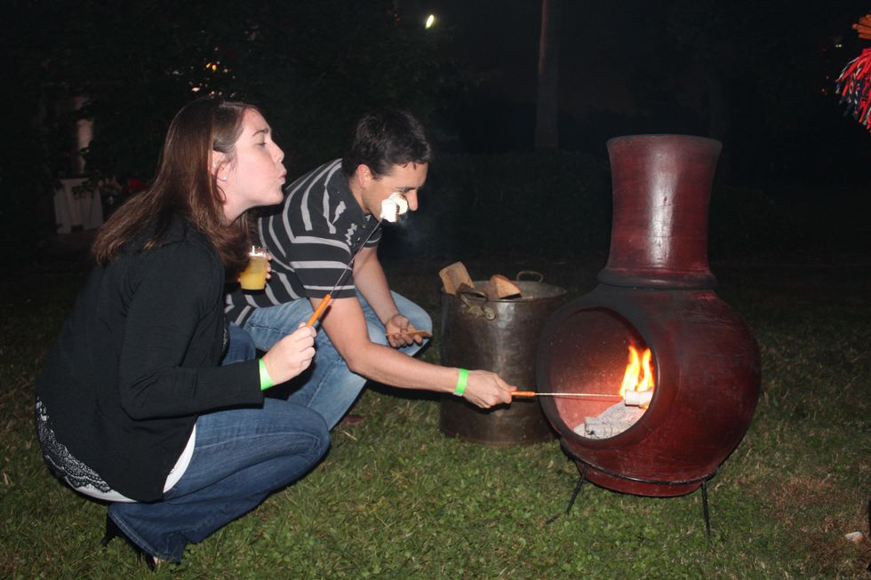 12 Kim Tarleton and Nick Ondrasek at the Herman Park Conservancy Ski the Green party November 2013