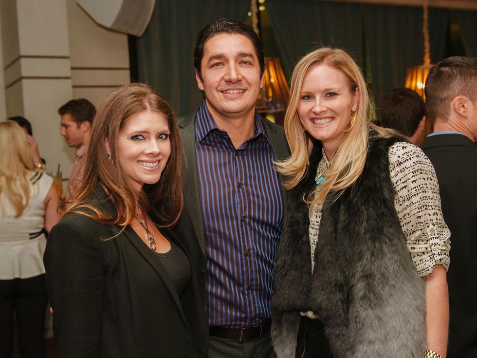 12 Kirsten and William Guerra, from left, with Leigh Evans at the CultureMap Social at Saint Genevieve October 2013