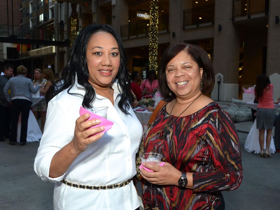 12 Patty Kyle, left, and Genevieve Joseph at the West Ave Turns Pink party October 2013