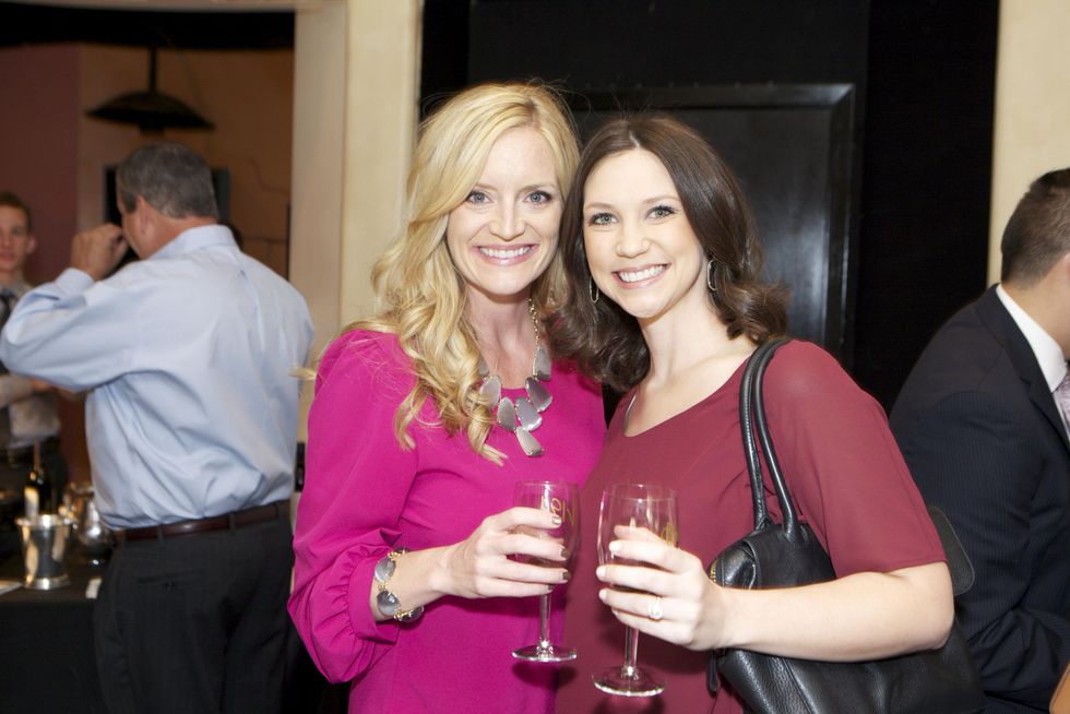 1211 Lisa Meeks, left, and Lindsey Porter at the Passport to the World wine and food event at The Health Museum October 2014