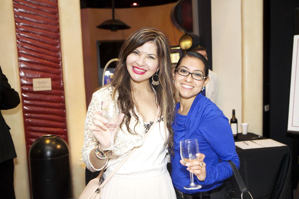 1288 Blanca Munoz, left, and Christy Garcia at the Passport to the World wine and food event at The Health Museum October 2014