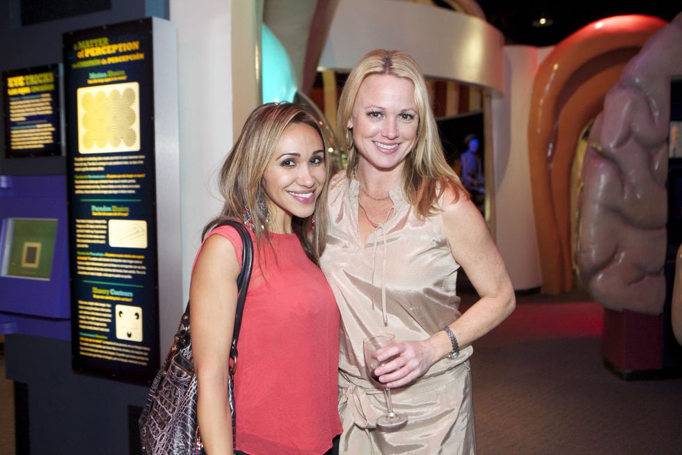 1296 Val Budworth, left, and Allison Skelton at the Passport to the World wine and food event at The Health Museum October 2014