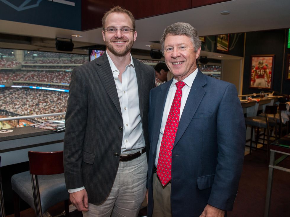 13 Robert Emmett, left, and Ed Emmett at the Houston Texans Owner's Suite party at NRG Stadium September 2014