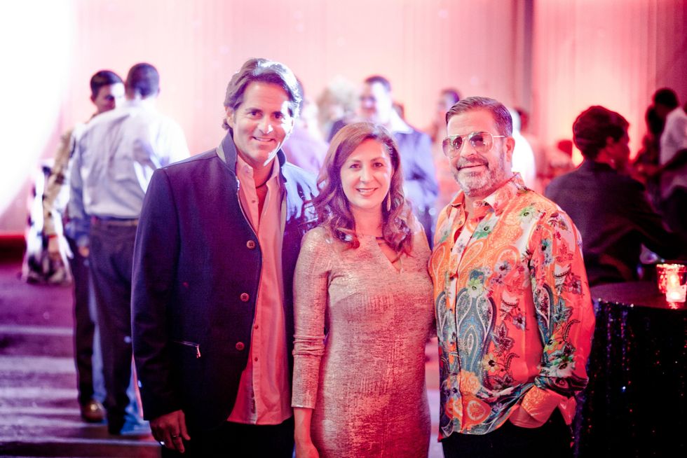 134 Michael Garfield, from left, Debbie Elias and Jeff Gorski at the Patient Financial Services 10th anniversary party April 2015