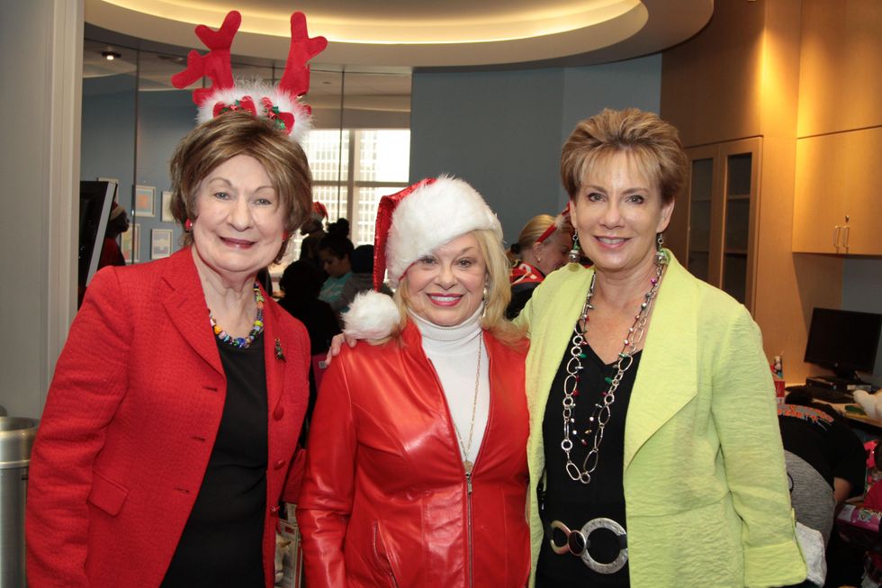 14 Cora Sue Mach, from left, Sidney Faust and Dr. ZoAnn Dreyer at Santa visits Texas Children's Cancer Center December 2014