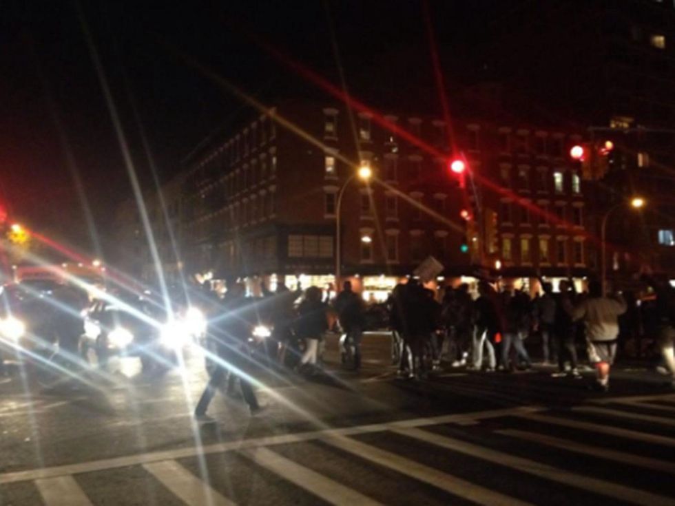 14 Houston Ferguson protest November 2014 Hundreds of protestors marching down Houston at Ave A, blocking traffic, shouting "hands up don't shoot" #Ferguson
