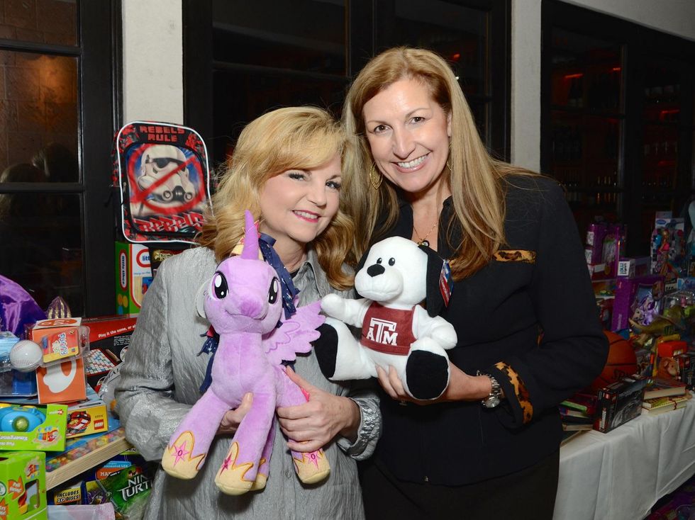 14 Kim Padgett, left, and Laurette Veres at Joyful Toyful December 2014