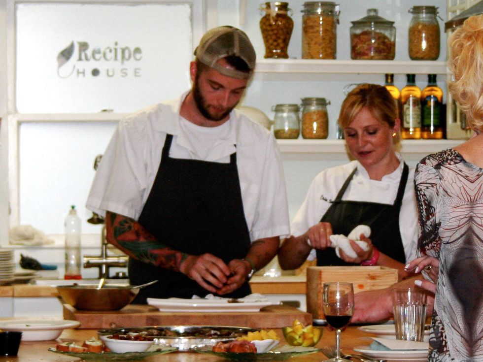 14 Recipe for Success dinner September 2013 chefs shucking oysters by Recipe for Success Foundation