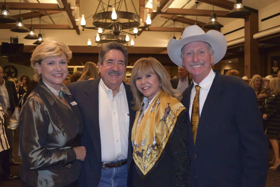 14 Susan Buddeke, from left, Ken McGuyer and Cyndy Garza Roberts and Thomas Roberts at the Houston Livestock Show and Rodeo Trailblazer honoree reception October 2014