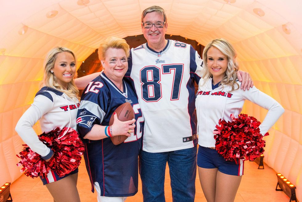 141 Cheerleader Kristy, from left, Dr. Jayne Finkowski-Rivera, Dr. Carlos Rivera and Cheerleder Kim at the Camp For All Super Ball February 2015