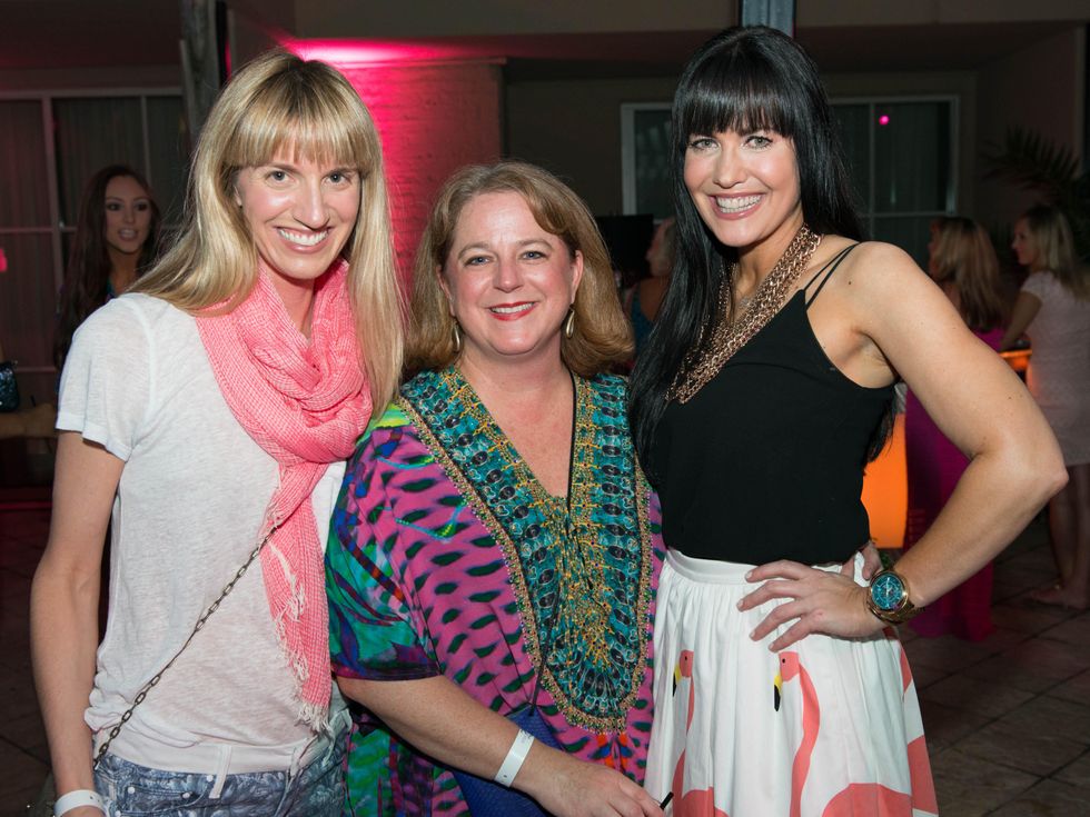 15 Chris Goins, from left, Shelley Ludwick and Tiffany Halik at the Pink Party at Hotel ZaZa July 2014