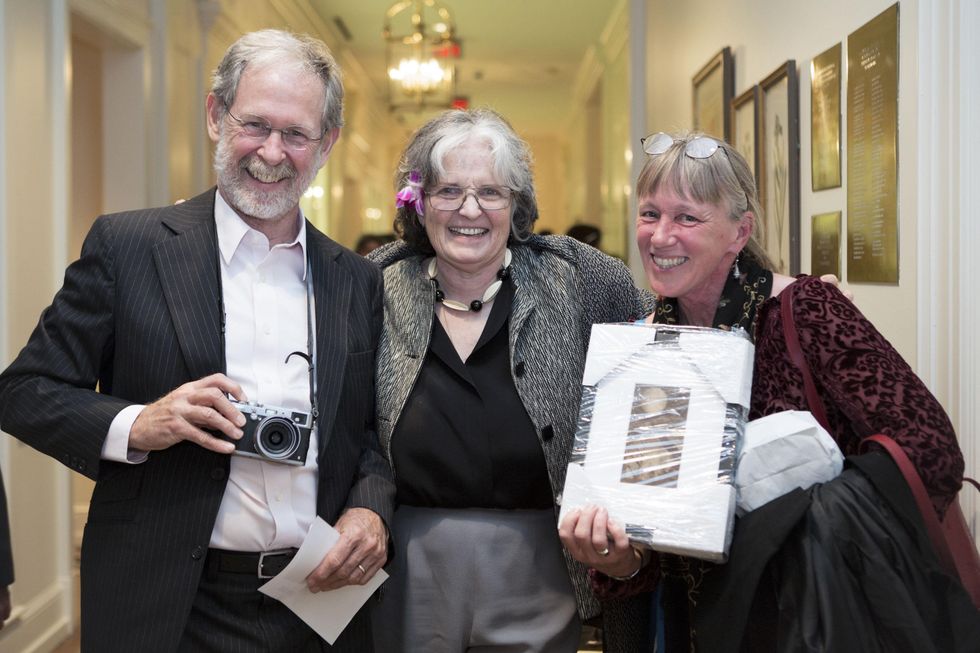 15 Paul Hester, from left, Anne Tucker and Lisa Hardaway at the Houston Center for Photography Print Auction February 2015