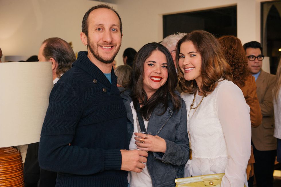 15 Sam Cole, from left, Nora Villarreal and Sarah Dunn at the Lynn Goode Vintage opening reception March 2014