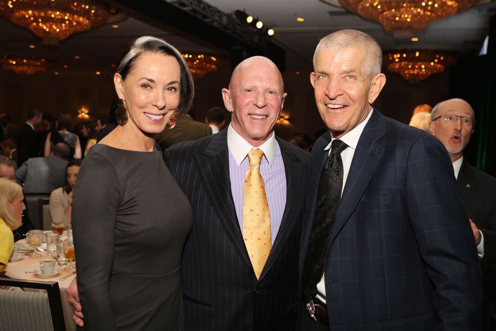 15 Sue and Lester Smith, from left, with Jim McIngvale at the Guardian of the Human Spirit luncheon November 2014