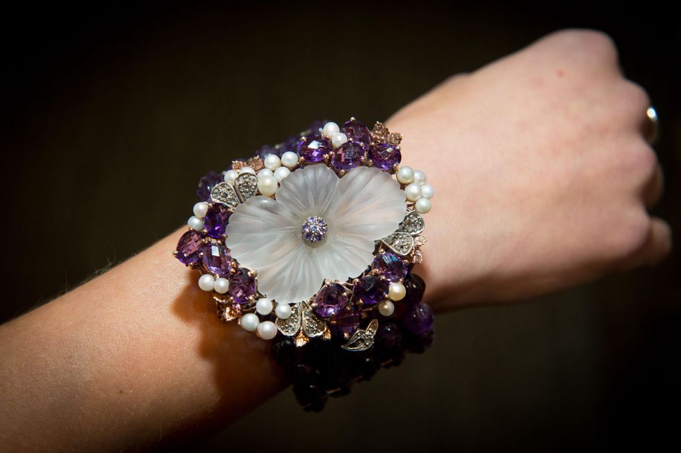 15 This bracelet is a one-of-a-kind piece made of amethyst, rose gold, silver, diamonds, and pearls -- valued at $25,000 and donated by Valobra Jewelry for Pin Oak\u2019s online silent auction at the Valobra Pin Oak holiday party December 2014