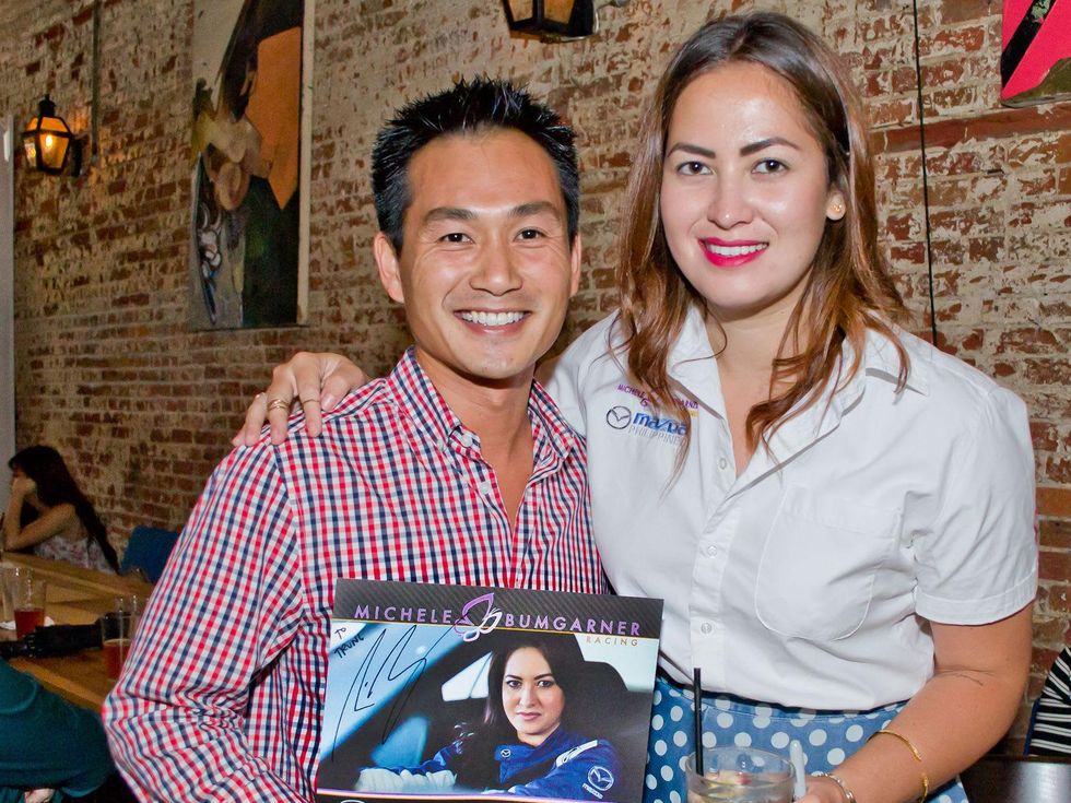 15 Trung Huynh and Michele Bumgarner at the Young Professionals Grand Prix kick-off party June 2014