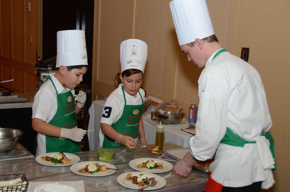 154 Bruscretta Team Diego Sarmiento, Robert Wood and Executive Chef JohnMicheal Lynch at Tutti ai Fornelli de La Piccola Cucina March 2015