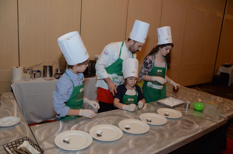 158 Cannolo Team from left Pier Francesco Papi, Veronica Pascucci, Executive Chef Fabio Potenzano and Giulia Sdingola at Tutti ai Fornelli de La Piccola Cucina March 2015