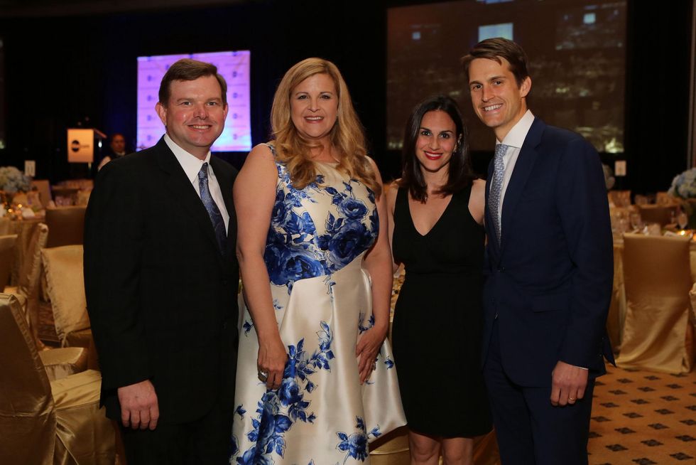 16 2318 Wallis and Dee Dee Marsh, from left, and Siobhan and A.J. Gracely at Blue Cure March 2015