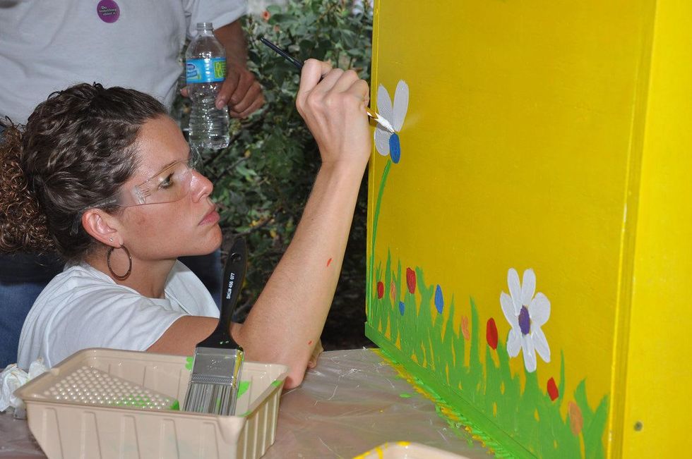 16 LINC member at young professionals build Tiny Libraries September 2014