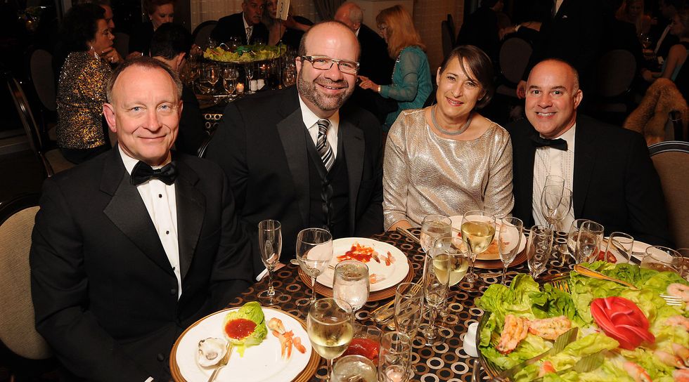 16 Randall Walker, from left, Rusty Bienvenue and Sylvia and Brian Malarkey at the Petroleum Club of Houston Grand Opening Celebration February 2015